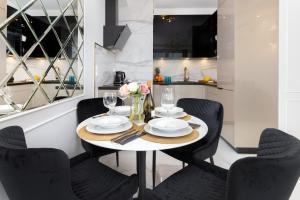 Posedenie v ubytovaní Plac Unii Apartment Gdynia Śródmieście by Renters Prestige