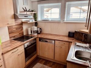 Kuchyň nebo kuchyňský kout v ubytování Musi Appartements