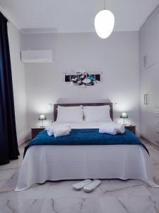 מיטה או מיטות בחדר ב-A&G Luxury House