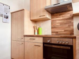 Kuchyň nebo kuchyňský kout v ubytování Musi Appartements