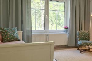 Posezení v ubytování Cosy Family Apartment