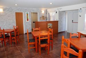 Un restaurant u otro lugar para comer en Hotel Parador Ruta 40