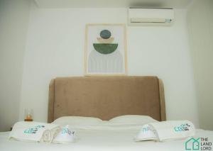 Ένα ή περισσότερα κρεβάτια σε δωμάτιο στο A22 Cozy and central at La Marsa