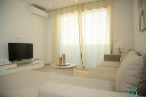 Μια τηλεόραση ή/και κέντρο ψυχαγωγίας στο A22 Cozy and central at La Marsa