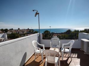 Zdjęcie z galerii obiektu Aldeas De Aguamarina Phase I Frontline Townhouse w mieście Cabo Roig