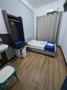 Postel nebo postele na pokoji v ubytování Sparta Team Hotel + 37 fotografií