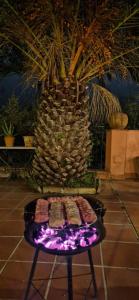 a table with food on it with a pineapple at villa favoloso in Taormina