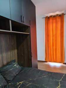 Tempat tidur dalam kamar di Apartmani Gavric Borovi 2