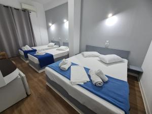 Postel nebo postele na pokoji v ubytování Sparta Team Hotel