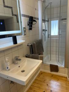 Ein Badezimmer in der Unterkunft Weingut Gästehaus Bach