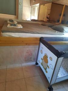 Kuchyňa alebo kuchynka v ubytovaní CsillagVár apartman