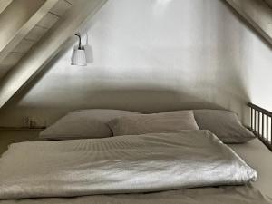 Кровать или кровати в номере Guffertblick