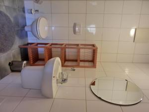 Ένα μπάνιο στο Ferienwohnung NH13