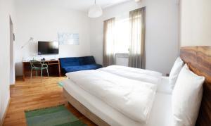 Postel nebo postele na pokoji v ubytování Altstadthotel Wetzel