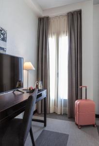 TV a/nebo společenská místnost v ubytování Hotel Macià Plaza + 25 fotografií