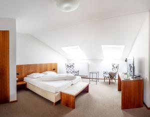 Postel nebo postele na pokoji v ubytování Altstadthotel Wetzel