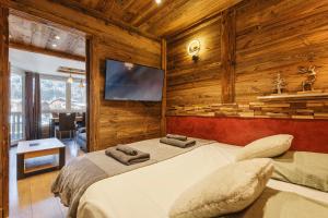 Posteľ alebo postele v izbe v ubytovaní Le Nid d'Aigle - Modern Apartment Next to Ski lift Prarion - By Cozee Rentals