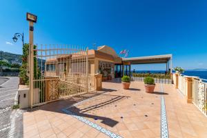 a villa with a view of the ocean at Hotel Sporting in Vico Equense