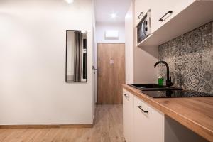 Kuchnia lub aneks kuchenny w obiekcie Dream Apartments - Gdańska 72
