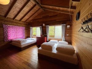 Ліжко або ліжка в номері Wen Qiao Villa