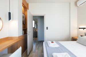 A bed or beds in a room at Villa Elia