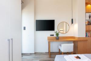 A television and/or entertainment centre at Villa Elia