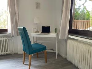 TV a/nebo společenská místnost v ubytování Ferienwohnung Hitzacker/Elbe