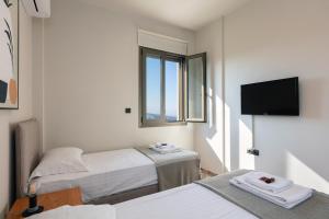 A bed or beds in a room at Villa Elia