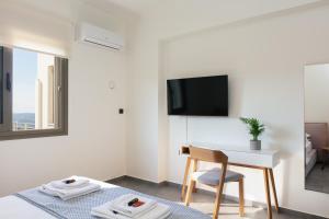 A television and/or entertainment centre at Villa Elia
