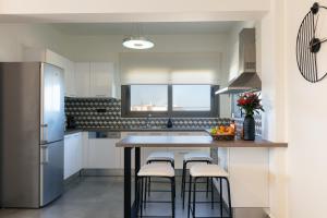 A kitchen or kitchenette at Villa Elia