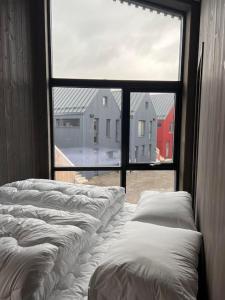 Postel nebo postele na pokoji v ubytování Stilren leilighet i Henningsvær