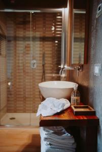 a bathroom with a sink and a shower at B&B Panorama Cinque in Salò