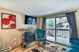 a living room with a fireplace and a tv at Free Ski Shuttle Mtn Escape in Breckenridge! in Breckenridge
