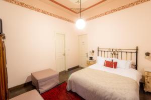A bed or beds in a room at Archontiko Naoumidi