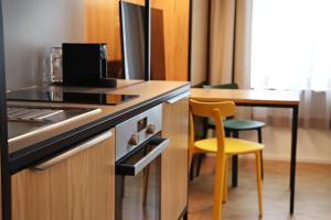 Kuchyň nebo kuchyňský kout v ubytování S12 - Boardinghouse by Hotel Trezor