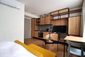 TV a/nebo společenská místnost v ubytování S12 - Boardinghouse by Hotel Trezor