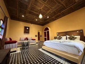 Postel nebo postele na pokoji v ubytování Hotel Riad Xaluca
