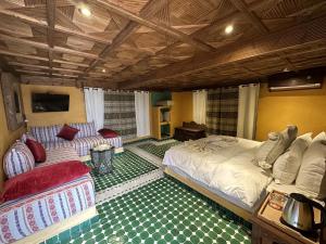 Posezení v ubytování Hotel Riad Xaluca