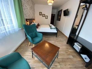 Postel nebo postele na pokoji v ubytování Hotel Rathaus