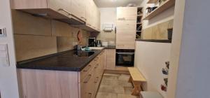 Kuchyň nebo kuchyňský kout v ubytování ciao-aschau Haus zur Burg Ap104 Pabst