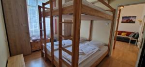 Postel nebo postele na pokoji v ubytování ciao-aschau Haus zur Burg Ap104 Pabst