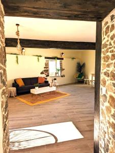 a living room with a couch and a table at Cozy 3 BR Home - Close to Beach in Lourinhã