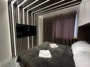 Llit o llits en una habitació de Mielno Escape Apartment