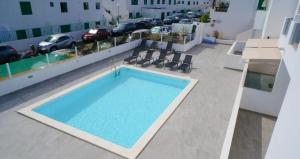 Výhled na bazén z ubytování Rociaga 35 Apartment 8, 100 meters to sea front nebo okolí