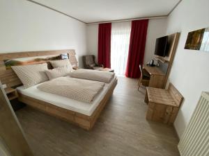 Postel nebo postele na pokoji v ubytování Hotel-Landgasthof Ploss