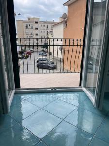 a view from a window of a parking lot at Mare e Sole in Maiori