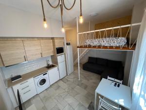 Kuchyňa alebo kuchynka v ubytovaní GENUAR APARTMENTS MALAGA CENTER 4