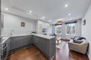 a kitchen with a sink and a counter top at Majestic 4 at Reganway RW4 in London