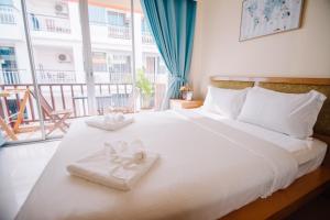 Cama o camas de una habitación en Patong Beach Side Hotel