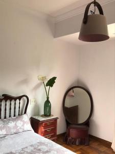 A bed or beds in a room at Primero Seixo antiguo